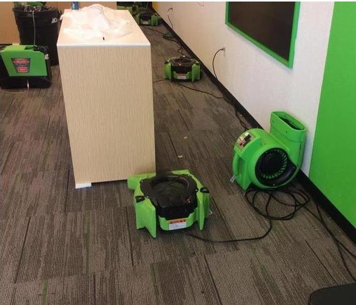 green equipment dries floors