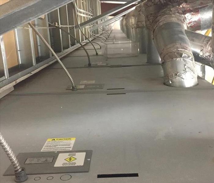 Duct work in overhead commercial space cleaned