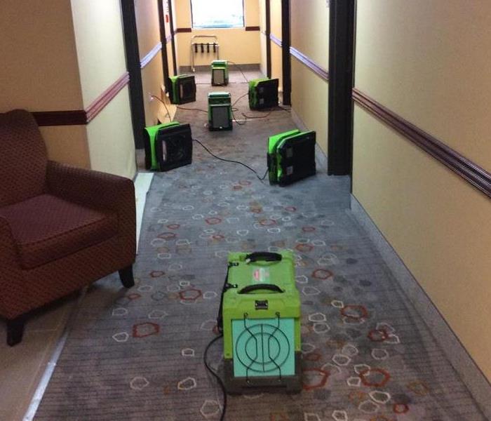 hotel hallway, green equipment