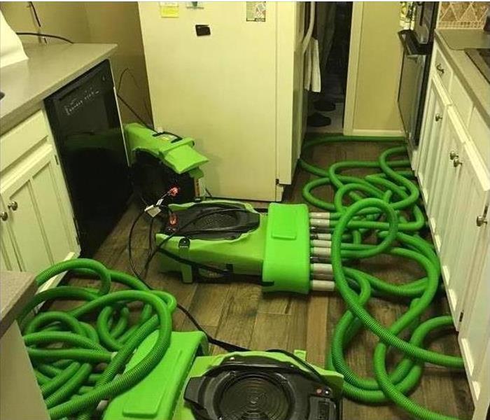 kitchen, wet floor, green equipment