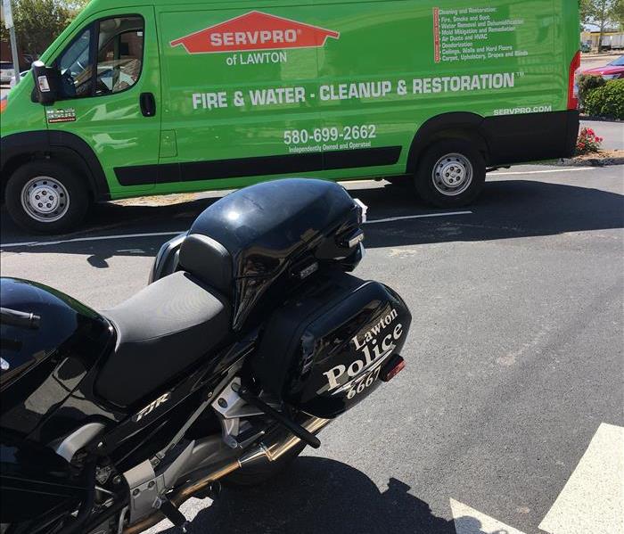 motorcycle and green van