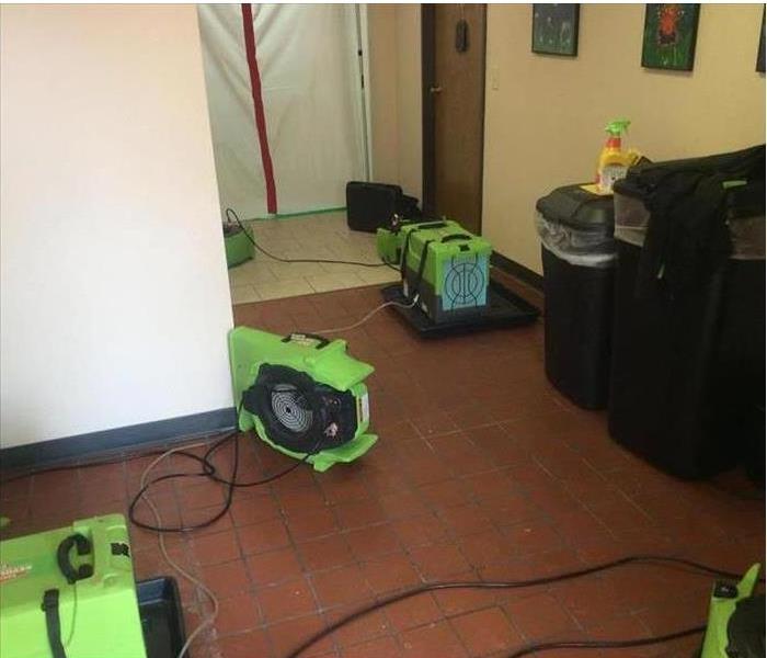 red tile floor green equipment