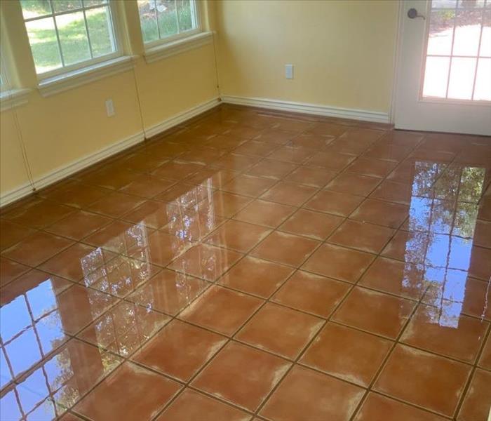 water on tile floor