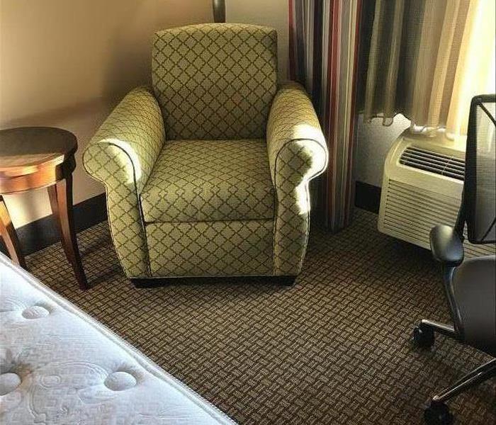 green chair, hotel room