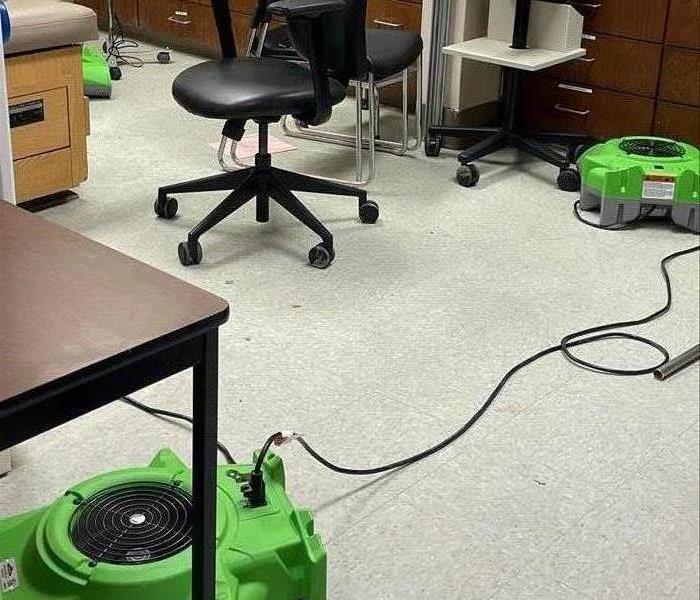 medical exam room with green fans