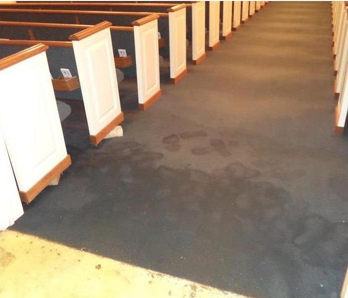 church sanctuary, pews, wet carpet